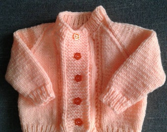 Little Girl's Sweater. (Peach Colour)