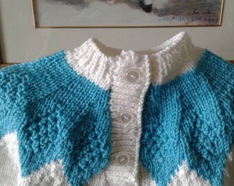 Little Girl's Sweater. Colour is Aqua.