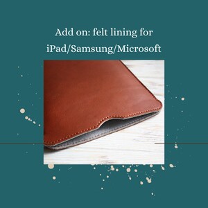 May include: Close-up of a brown leather tablet case with a gray felt lining. The case is open and the felt lining is visible. Add on: felt lining for iPad/Samsung/Microsoft