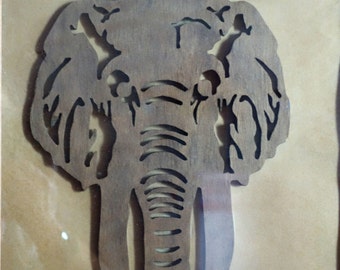 ELEPHANT and ZEBRA PAINTINGS in wood cut by fretwork. Artisanal work