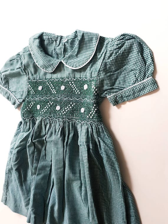 2-year-old dress vichy retro and vintage. White an