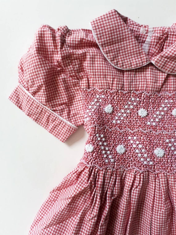 2-year-old dress vichy retro and vintage. White an