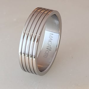 3mm, 4mm, or 6mm stainless steel men&#39;s / women&#39;s wedding band polished finish 4 grooved rings by Macaiori.