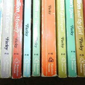 May include: A collection of vintage Farley books, featuring titles like "Stallion Races" and "Stallion Mystery." The spines are in various colors, with the author's name and the publisher, Random House, clearly visible. The books are numbered F-11 through F-20.