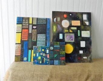 May include: Four abstract paintings with geometric shapes and patterns in shades of blue, green, yellow, red, orange, and white on a black background.