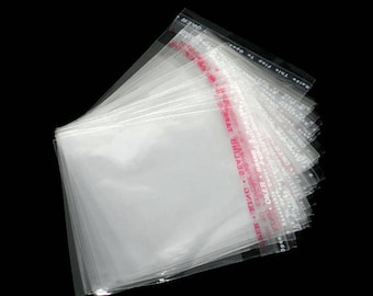 AU18    Lot de 50 sachets emballages  7x6cm transparent cristal autocollants pour perles