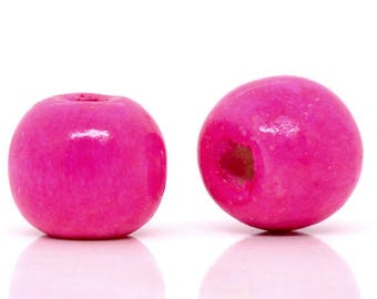 PBois28 - Lot de  50 perles rondes en bois 10mmx9 , rose fuchsia