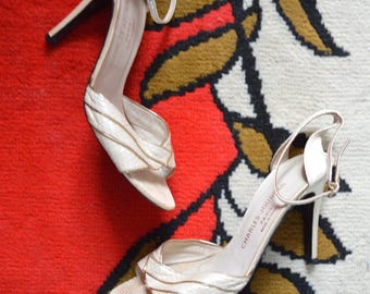 Vintage 1970s Charles Jourdan heels // cream snakeskin gold ankle strap peep toe sandals // glamourous disco party evening high stiletto 8