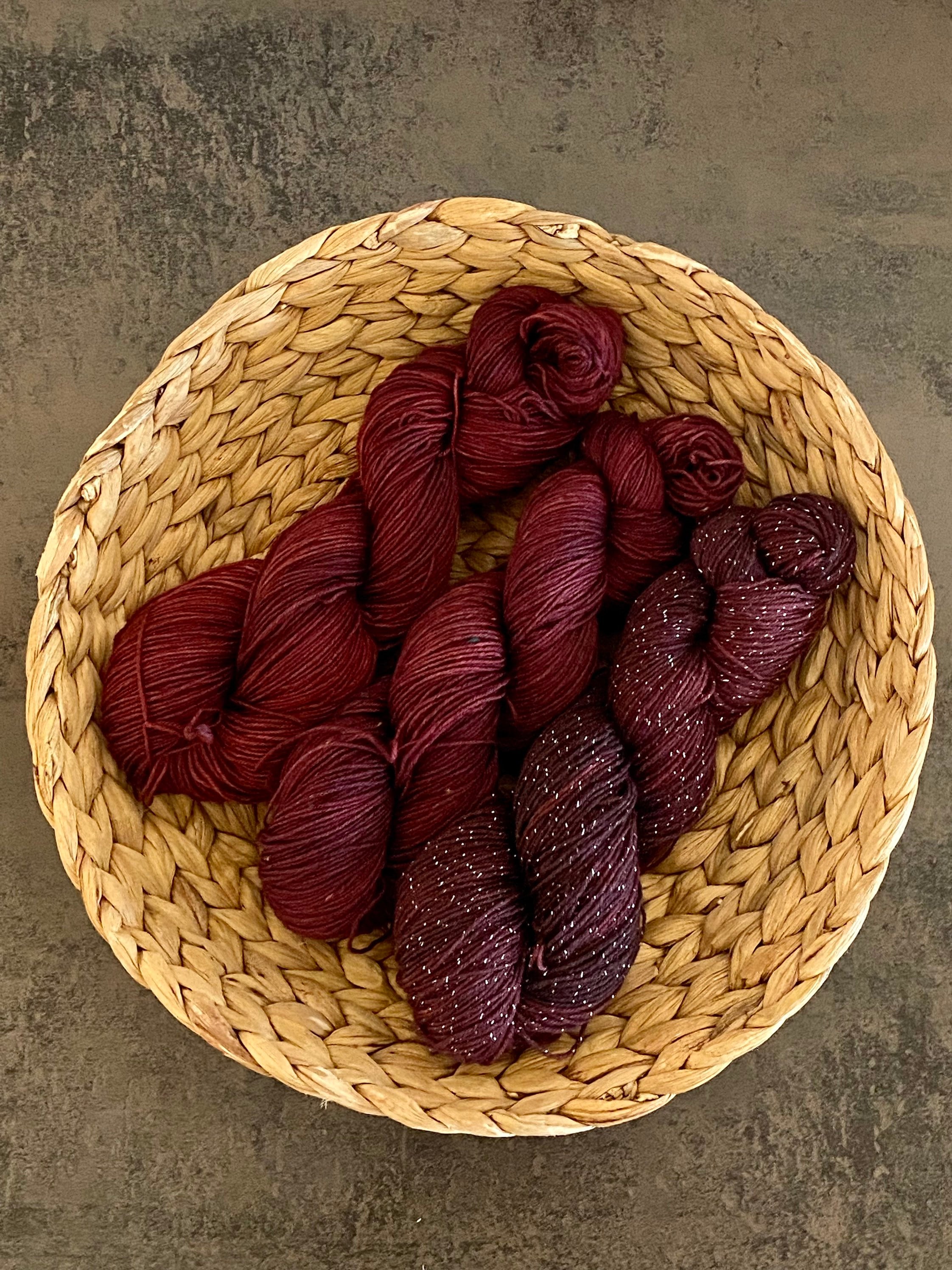 Bright red wool yarn in cones