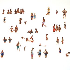 Little men under the sun, immersed in a sea of oil. La Couarde Beach