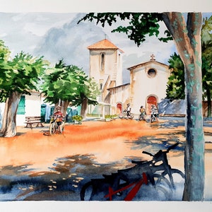 A bonita praça da igreja de Loix, Ile de Ré