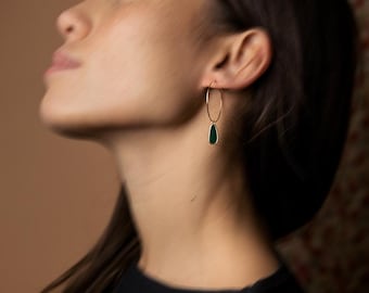 IRO minimalist style gold-plated brass hoop earrings with enamelled drops