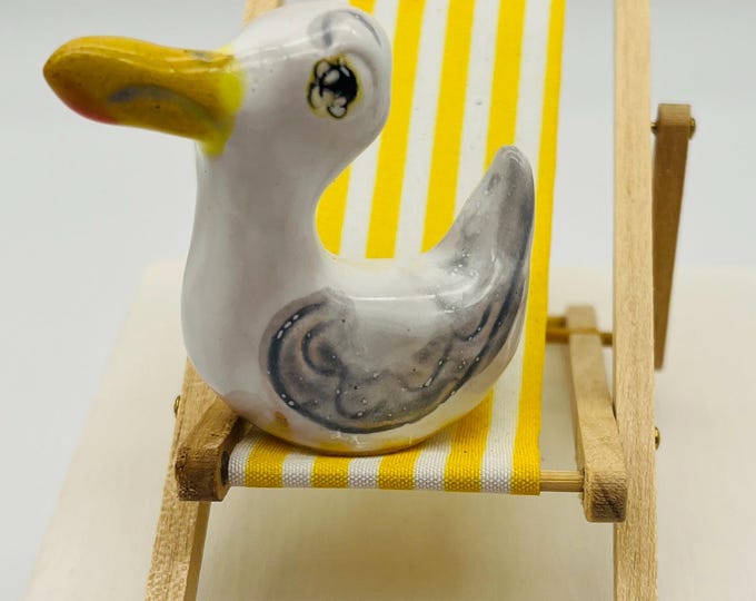 Seagull Pottery Ornament: Quirky Bird on Yellow Deckchair