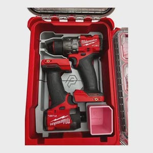 May include: A red Milwaukee Fuel drill and impact driver set stored inside a red plastic carrying case with a custom grey molded insert. The tools feature black rubberized grips and white branding. A small pink square container is also included.