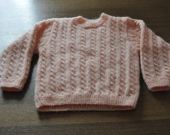 suéter con toque de salmón