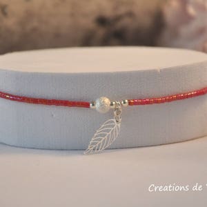 Red miyuki bracelet and filigree leaf
