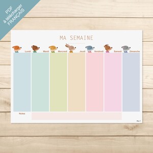 Puede incluir: Un planificador semanal titulado MA SEMAINE con siete columnas verticales en azul claro, verde, amarillo, naranja, rosa y lavanda. Cada columna está encabezada por una pequeña ilustración de un animal y el día de la semana en francés.