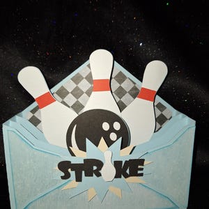 Cartão de felicitações pop-up 3D de boliche