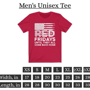 May include: Red unisex t-shirt with a distressed white graphic of an American flag and the text "RED FRIDAYS UNTIL THEY ALL COME BACK HOME". Size chart included in inches.