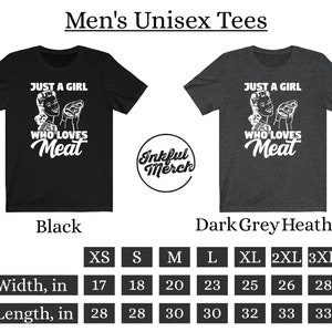 May include: Black and dark grey heather unisex t-shirt with a vintage style illustration of a woman holding a piece of meat. The text reads "Just a girl who loves meat". The shirt is available in sizes XS to 3XL. The width and length measurements are listed in inches.