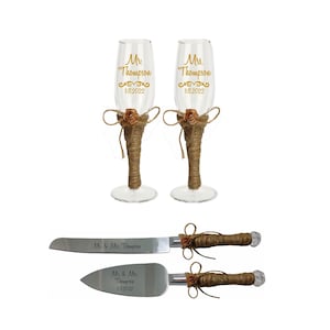 May include: Two champagne flutes with burlap wrapped stems and a gold inscription that reads "Mr. Thompson 11.8.2022" and "Mrs. Thompson 11.8.2022". A matching cake knife and server with burlap handles and the inscription "Mr. & Mrs. Thompson 11.8.2022" are also included.