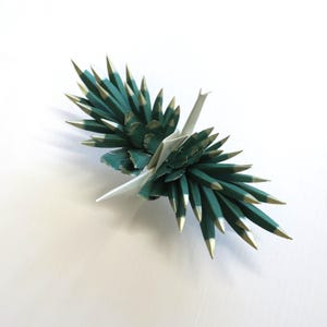 Grue à plumes en origami - Festival vert