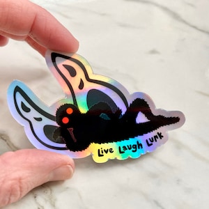 Holographic Mothman Original Live Laugh Lurk sticker