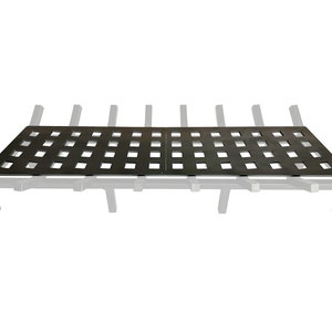 May include: Black metal fireplace grate with a square grid pattern. The grate is designed to fit over a standard fireplace grate.