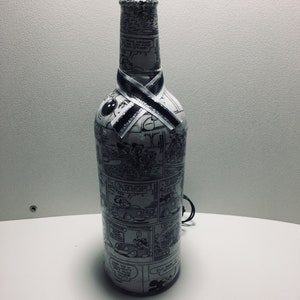 Botella luminosa de Mickey Mouse con tira cómica