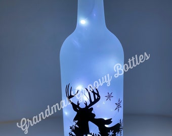 Botella luminosa con forma de ciervo