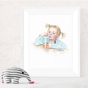 May include: A watercolor painting of a young girl with blonde hair, wearing a light blue shirt with white polka dots, drinking from a glass with a straw. The painting is framed in a white frame.