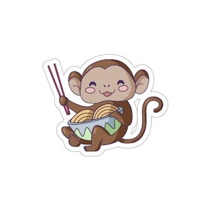 ラーメンを食べるかわいい猿のダイカットステッカー。ラーメン好きの人へのギフト