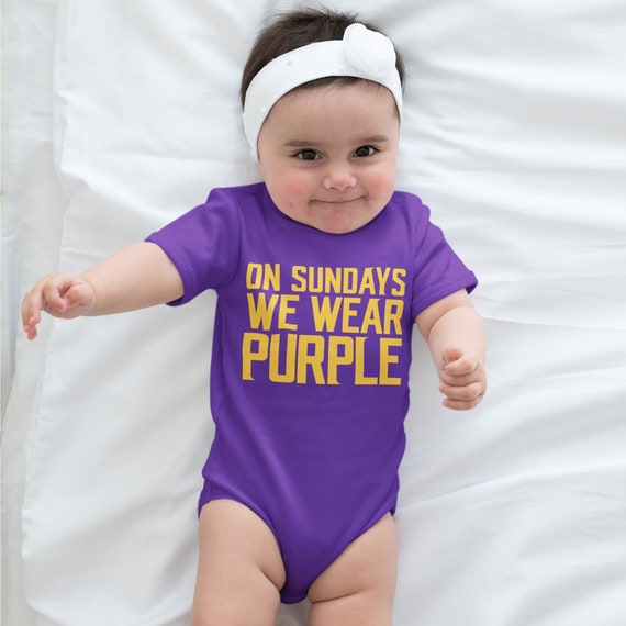 This Minnesota bodysuit will make you look like a viking of the tailgate,  braving the harsh winters of Minneapolis to raid the opposing team