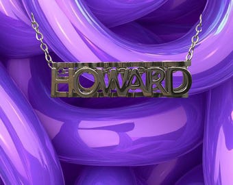 May include: A metallic nameplate necklace featuring the name HOWARD in block capital letters, suspended from a thin chain. The necklace is positioned against a background of glossy, intertwined purple tubes with a smooth, reflective surface.