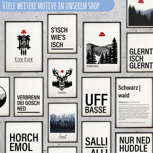 May include: A collection of black and white illustrations with red accents. The illustrations feature various designs, including a cuckoo clock, a deer, a forest scene, and text in German. The text includes phrases like "Kuck Kuck", "S'isch Wie's Isch", "Schwarz Wald", and "Verbren Dei Gosch Ned".