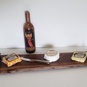Charcuterie board Geppetto board serving tray cheese board handcrafted live edge black walnut with handles and feet