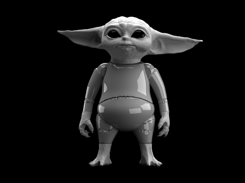 May include: A gray, plastic toy figure of a fictional character with large ears, a large head, and a small body. The figure is standing with its arms at its sides.