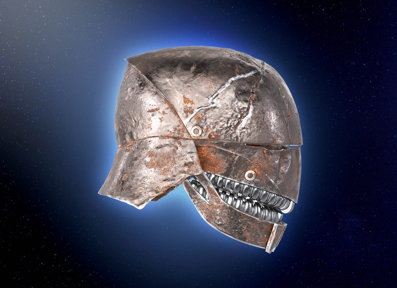 May include: A rusty metal helmet with a detailed, mechanical jaw. The helmet is set against a dark blue background with white stars.