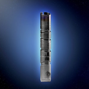 May include: A silver lightsaber hilt with a textured surface and a black button on the bottom.