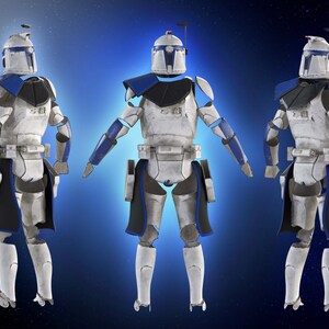 May include: Three white and blue Clone Trooper armor suits. The armor features blue accents on the helmet, shoulders, and arms. The suits have black and blue details on the lower torso and legs. The background is a gradient of blue and white.