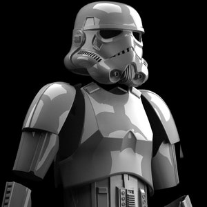Pode incluir: Um capacete e uma armadura de Stormtrooper de plástico branco e cinza. O capacete tem uma viseira preta e um design detalhado. A armadura tem uma superfície texturizada e vários detalhes.