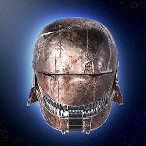 May include: A rusty metal helmet with a detailed design, featuring a visor and a row of teeth-like protrusions. The helmet is set against a dark blue background with white stars.