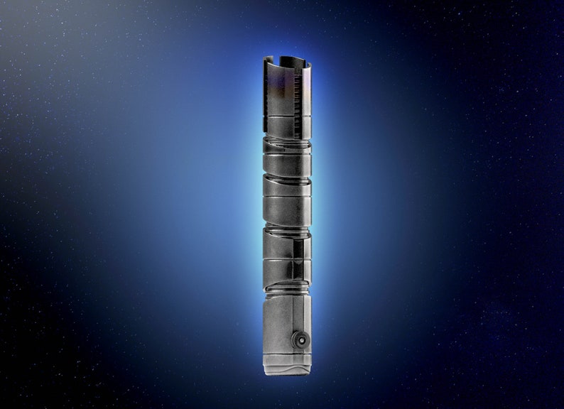 May include: A silver lightsaber hilt with a textured surface and a black button on the bottom.