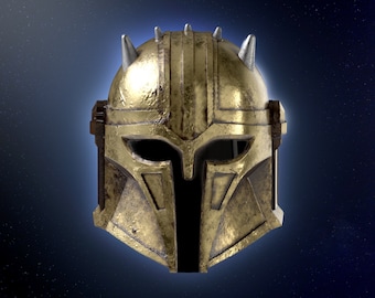 May include: A gold helmet with a black visor and silver spikes. The helmet has a weathered, worn look.