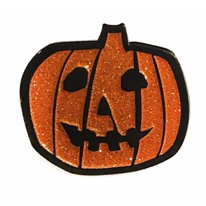 May include: Orange glitter pumpkin with a black jack-o'-lantern face.