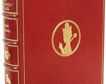 DODGSON: (Lewis Carroll). A través del espejo y lo que Alicia encontró allí. (1872 - PRESENTACIÓN COPY Primera edición primer número)