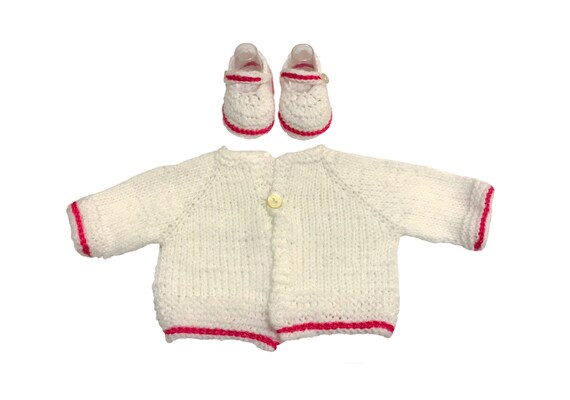newborn white knitted cardigan