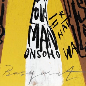 May include: A yellow, white, and brown abstract painting with black text that reads "I've got you, man = r, half, and walk on soho". The painting is signed "Beu".