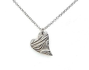 Silver Floral Heart Pendant Necklace, asymmetric heart.