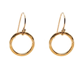 Yellow gold vermeil open circle drop earrings. Handmade hammered circle dangle earrings. Yellow gold plated silver.